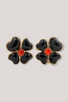 Boucles d'oreilles trèfle à quatre feuilles fermoir clip pâte de verre noir et centre corail