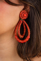 Boucles d'oreilles XXL rouge corail rondelles de strass et perles pendantes femme
