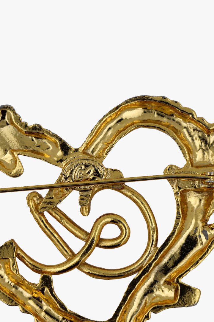 Broche signée Christian Lacroix en forme de coeur doré