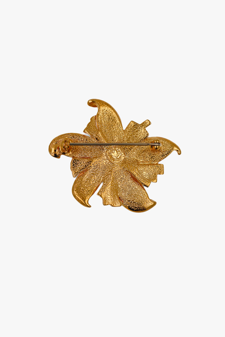 Broche en forme de fleur doré vintage