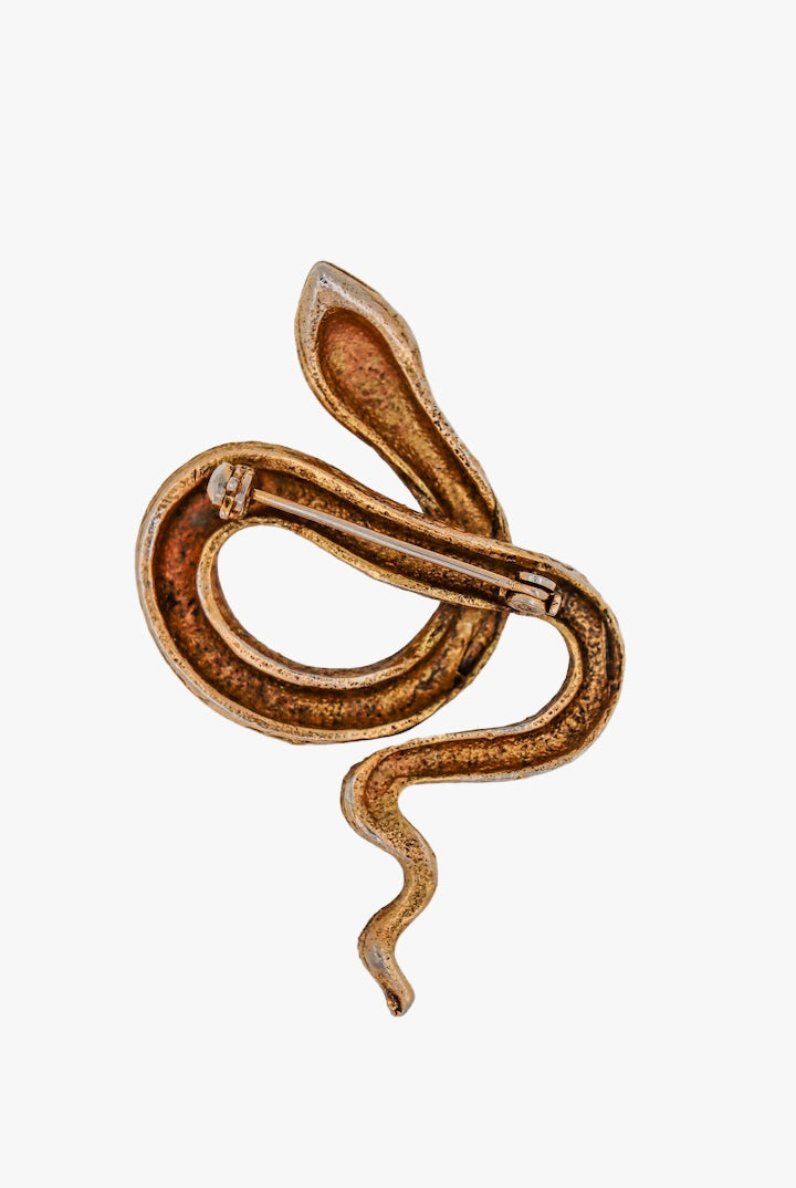 Broche serpent doré ornée de pierre rouge