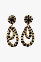 Boucles d'oreilles pendantes avec perles noires et rondelle de strass dorée - fermoir clip