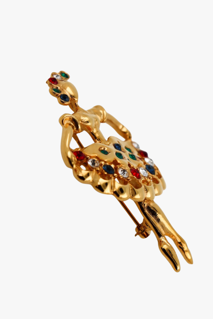 Broche en silhouette de danseuse étoile vintage dorée et détail strass coloré vert rouge blanc et bleu