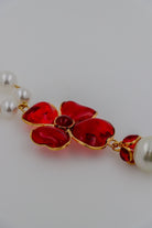 Collier femme fantaisie en perles motif trèfle à quatre feuilles en pâte de verre rouge rubis mode