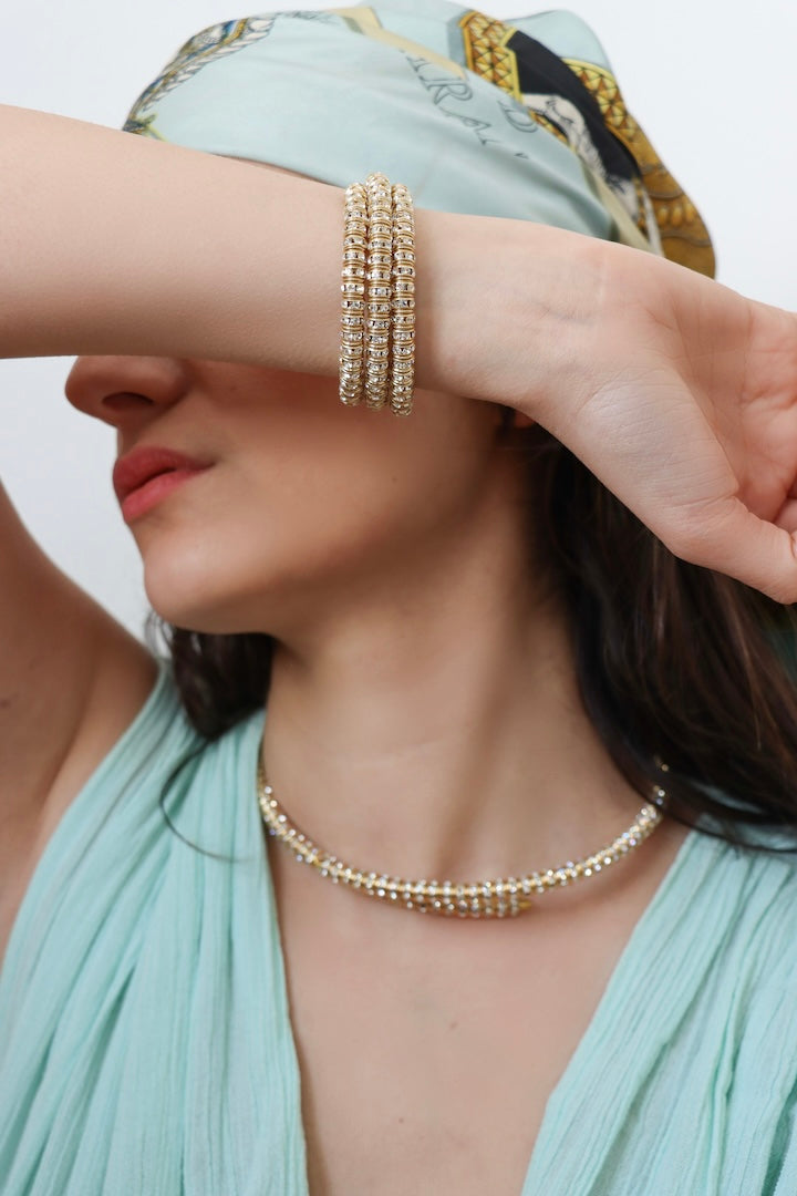 Bracelet en strass doré et le collier assorti fabriqué en France