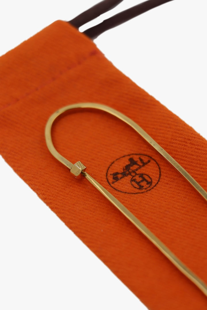 Broche fantaisie dorée hermès paris logo hermes vintage accessoire fantaisie