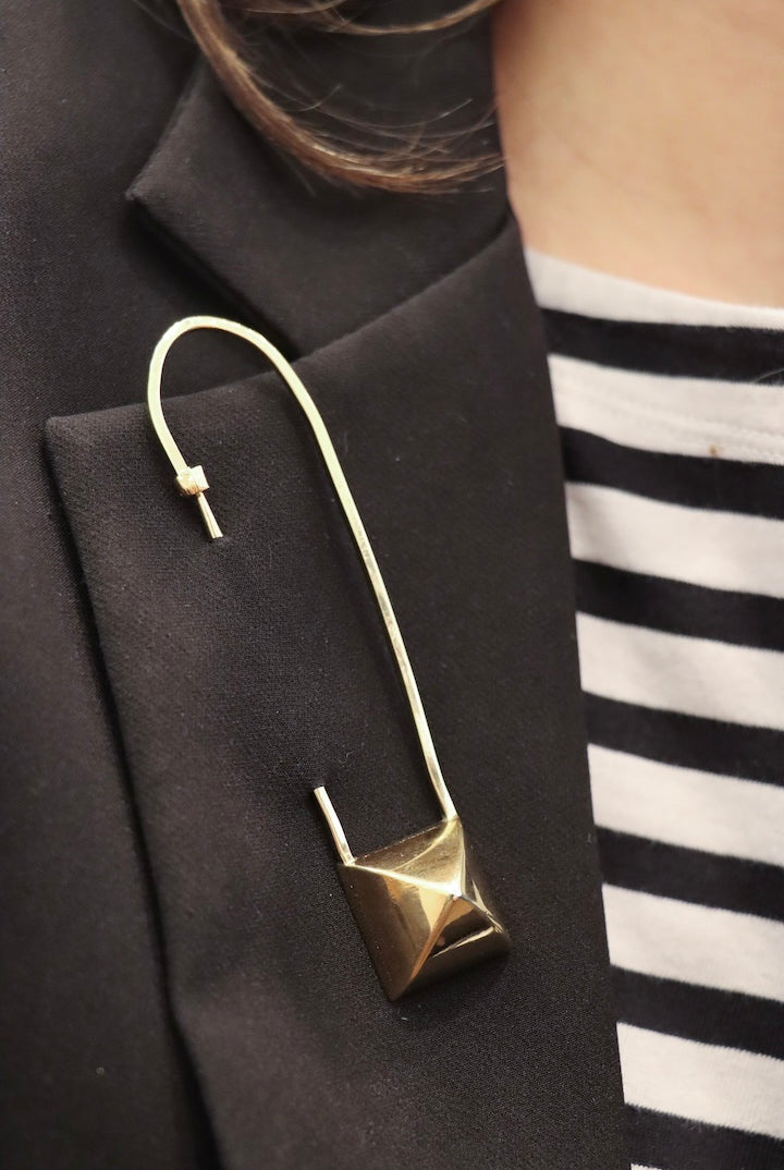 Broche dorée vintage de chez Hermes Paris accessoire fantaisie de luxe