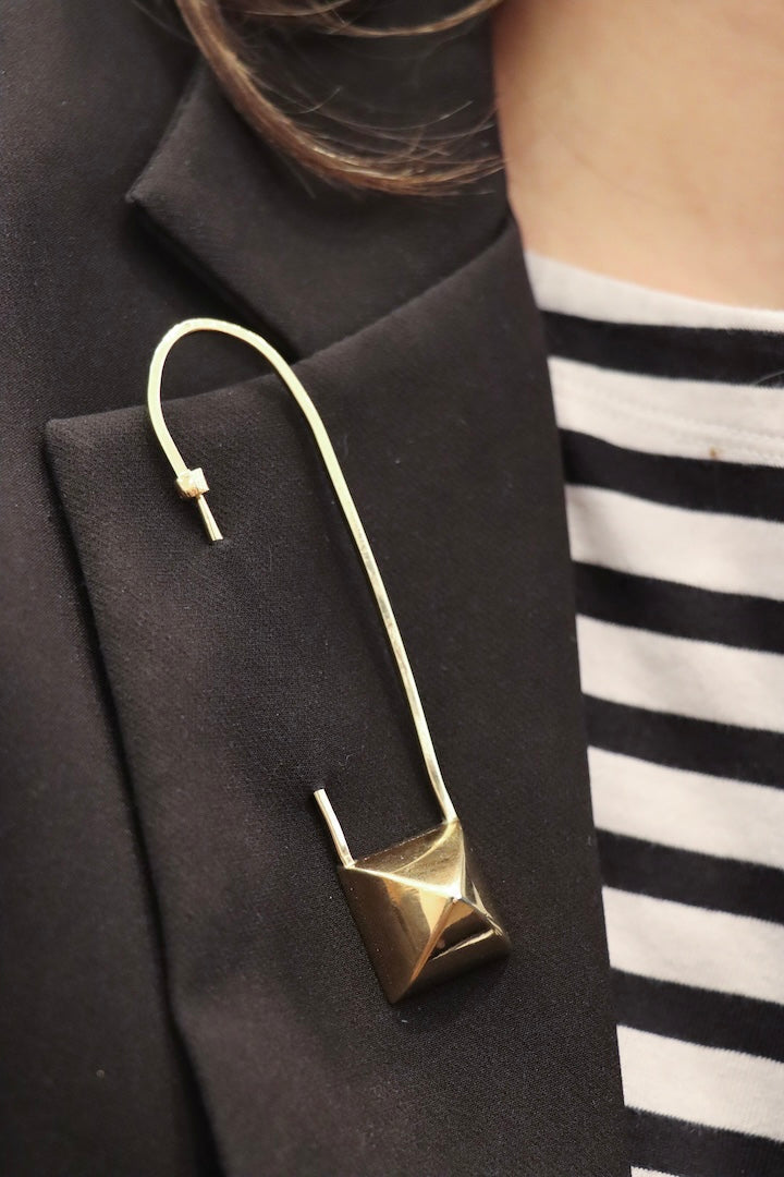 Broche dorée vintage de chez Hermes Paris accessoire fantaisie de luxe