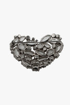 Broche en forme de cour de dos composé de strass 