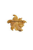 Broche vintage fleur dorée à strass cristal, sélectionnée par Françoise Montague Paris