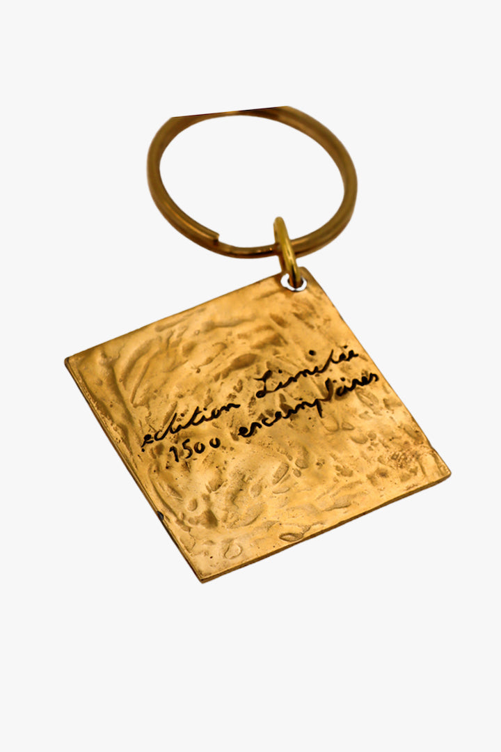 porte clés vintage Yves saint laurent doré 