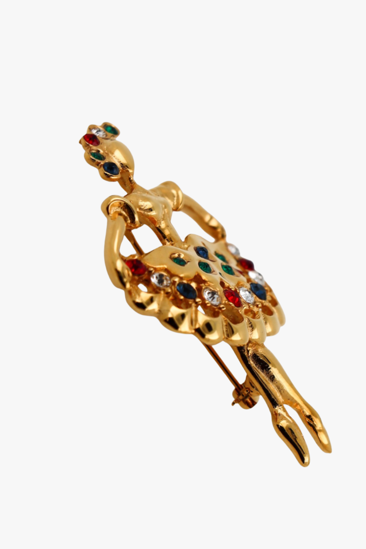 Broche en silhouette de danseuse étoile vintage dorée et détail strass coloré vert rouge blanc et bleu 