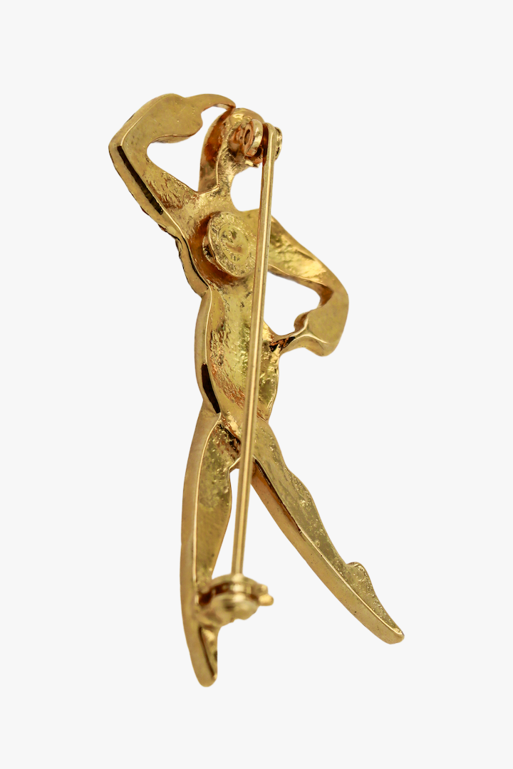 Broche vintage dorée en forme de danseur étoile 